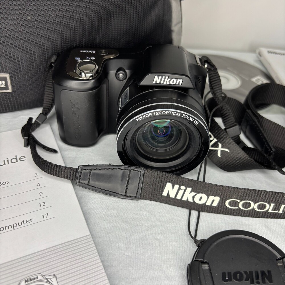 NIKON CoolPix L100 Camera with Bag Lens Cap Lanyard Book Wires